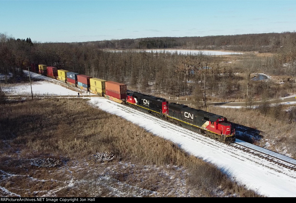 Passing through the wetland areas south of Holly, a pair of CN SD60's lead L514 down the Holly Sub